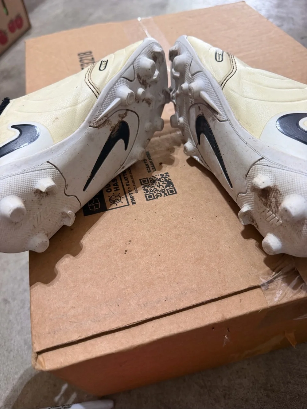 Nike Kids Slip-On Soccer Cleats in Cream and Black